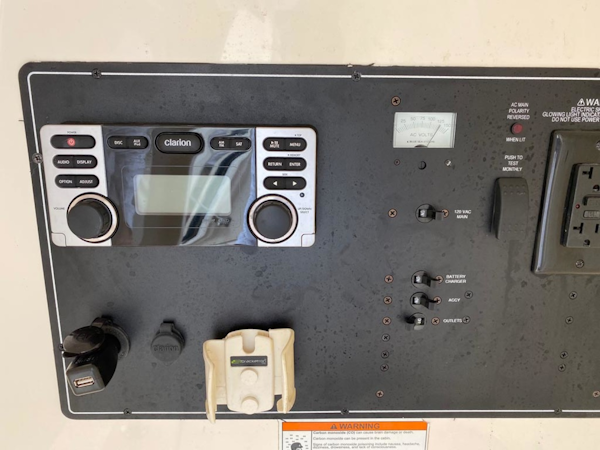 Pursuit-ST310 Center Console 2014 -Boca Raton-Florida-United States-Clarion Stereo And Electrical Panel-1280875