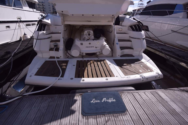 Sunseeker-Predator 2003-Low Profile PALM BEACH-Florida-United States-Tender In Garage View From Dock-1576395
