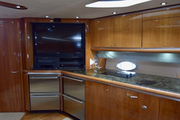Sunseeker-Predator 2003-Low Profile PALM BEACH-Florida-United States-Galley With Flat Screen TV Open Doors-1576339