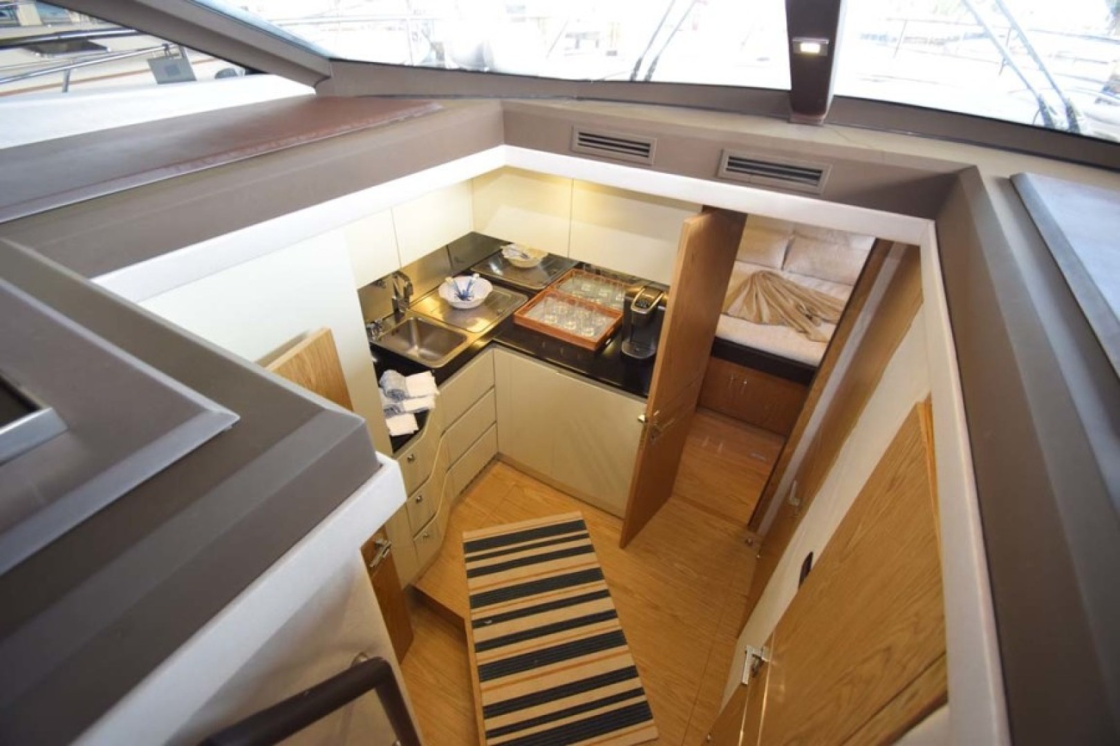 Sessa-C54 Express 2011 -Lighthouse Point-Florida-United States-Galley down and forward VIP Stateroom-1477099 | Thumbnail