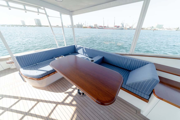 Jim Smith-Walkaround Express 2018-Eurybia North Palm Beach-Florida-United States-Teak Table and Storage underneath Seating-1573737