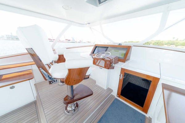 Jim Smith-Walkaround Express 2018-Eurybia North Palm Beach-Florida-United States-2 x Bluewater Helm Chairs Mounted on Step up Teak Floor-1573731