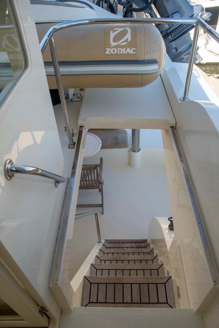 Hampton-60 Motor Yacht 2007-Family Biz Mount Pleasant-North Carolina-United States-Stairs from Flyridge to Aft Deck-1600115 | Thumbnail