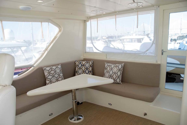 Hampton-60 Motor Yacht 2007-Family Biz Mount Pleasant-North Carolina-United States-L-Seating, Triangular Hi-Lo Table-1600109