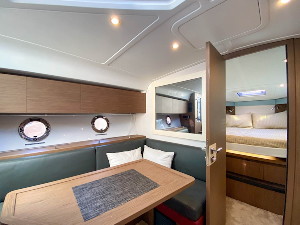 Beneteau-Gran Turismo 40 2019-007 Aventura-Florida-United States-Salon Settee and Table and Entrance to Stateroom-1667289