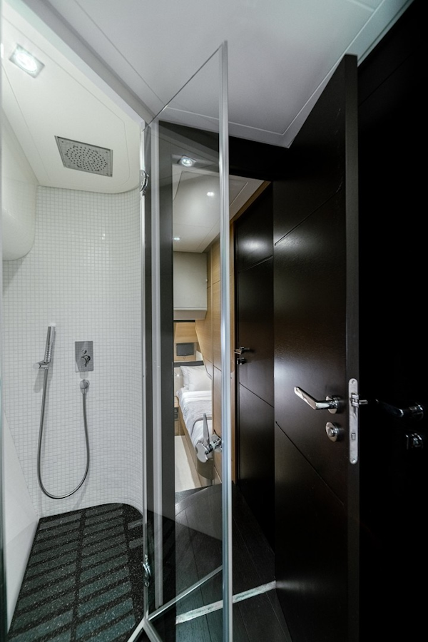 Pershing-64 2011-Aretecte Miami-Florida-United States-Stall Shower with New Corian Floorboard with Non-Slip Tape, Ceiling Rain Head, Wall Handheld-1813514