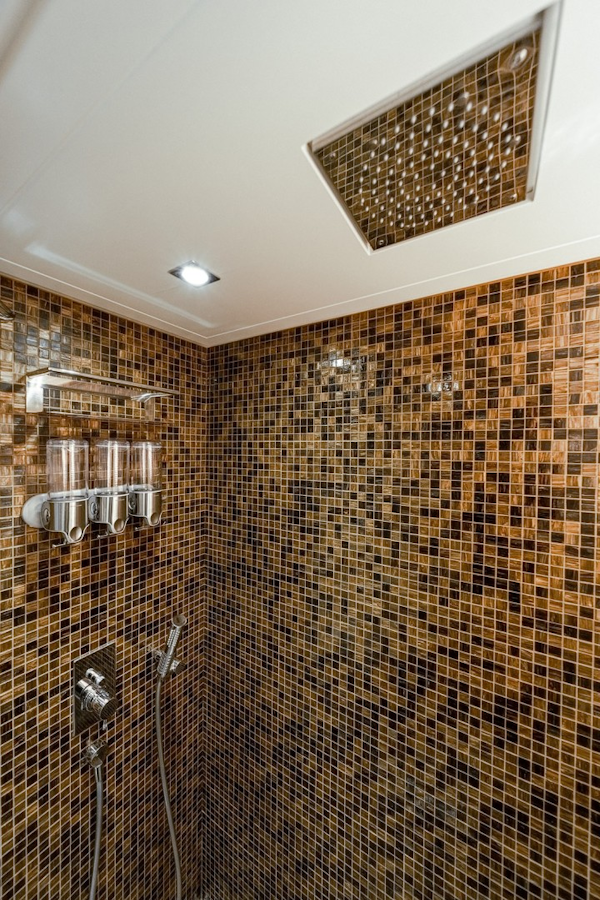 Pershing-64 2011-Aretecte Miami-Florida-United States-Shower with Mosaic Tile, Corian Seat, Recessed Lighting, Soap Dispenser, Glass Enclosure, Rain Shower Head and Standard Shower Handheld Sprayer-1813496
