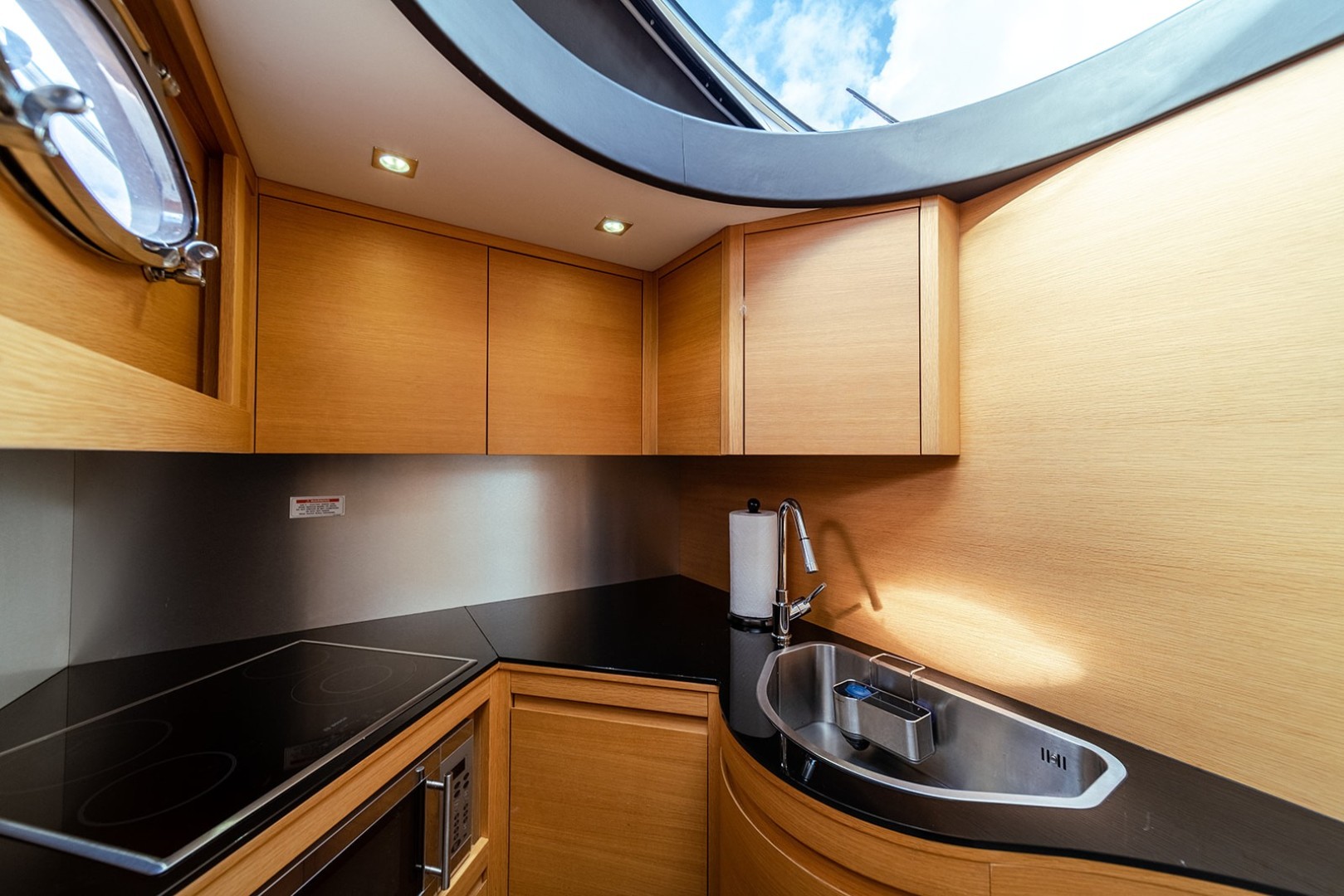 Pershing-64 2011-Aretecte Miami-Florida-United States-Galley  Bosch Refrigerator and Freezer, Miele Dishwasher and Stainless Steel Sink-1813482 | Thumbnail