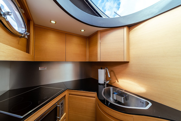 Pershing-64 2011-Aretecte Miami-Florida-United States-Galley  Bosch Refrigerator and Freezer, Miele Dishwasher and Stainless Steel Sink-1813482