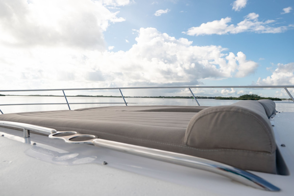 Savannah-54 2011-INVERSE ENTROPY Fort Lauderdale-Florida-United States-Sun lounge with stainless-steel rail and drink holders, port and starboard-1868642