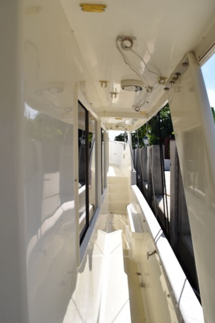 Grand Alaskan-64 Pilothouse 1999-SOFT TOUCH Fort Lauderdale-Florida-United States-Starboard Side Breezeway-2183995 | Thumbnail