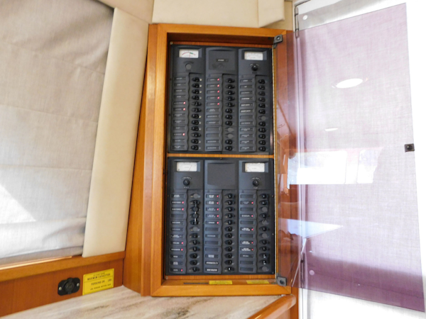 Riviera-48 Enclosed Flybridge 2003-Moxsea Merritt Island-Florida-United States-AC-DC Distribution Panel to Starboard-3267564