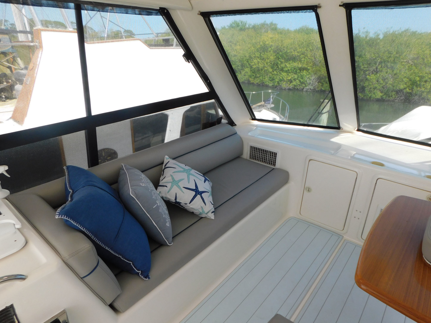 Riviera-48 Enclosed Flybridge 2003-Moxsea Merritt Island-Florida-United States-Port Side Lounging-3267588 | Thumbnail