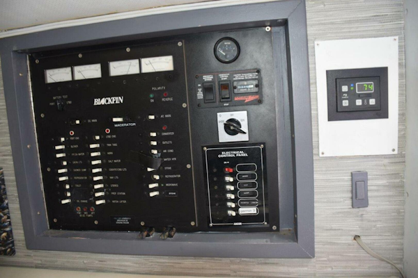 Blackfin-Combi 33 1995-ITS A WRAP Highland Beach-Florida-United States-Main Electrical Panel And Air Conditioning Control-5398683