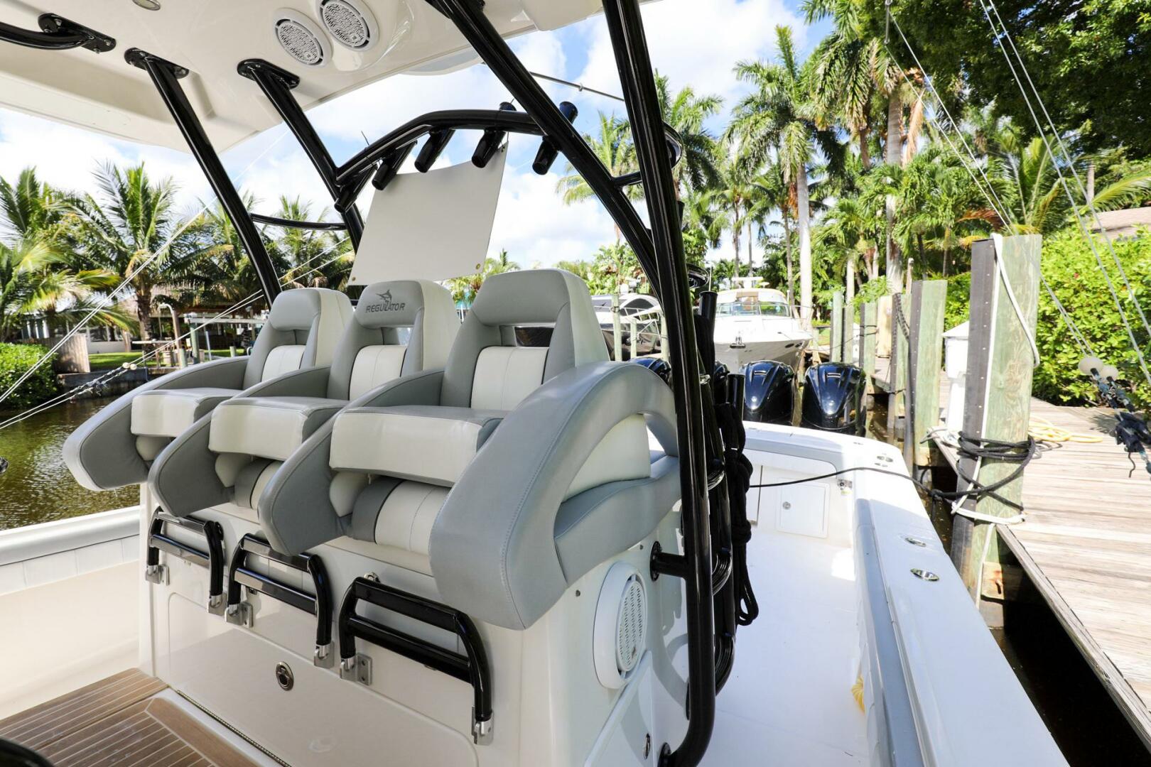 Regulator-41 2020-Grey Hull Stuart-2020 Regulator 41 boat with luxurious seating and modern design at a dock.-4946332 | Thumbnail