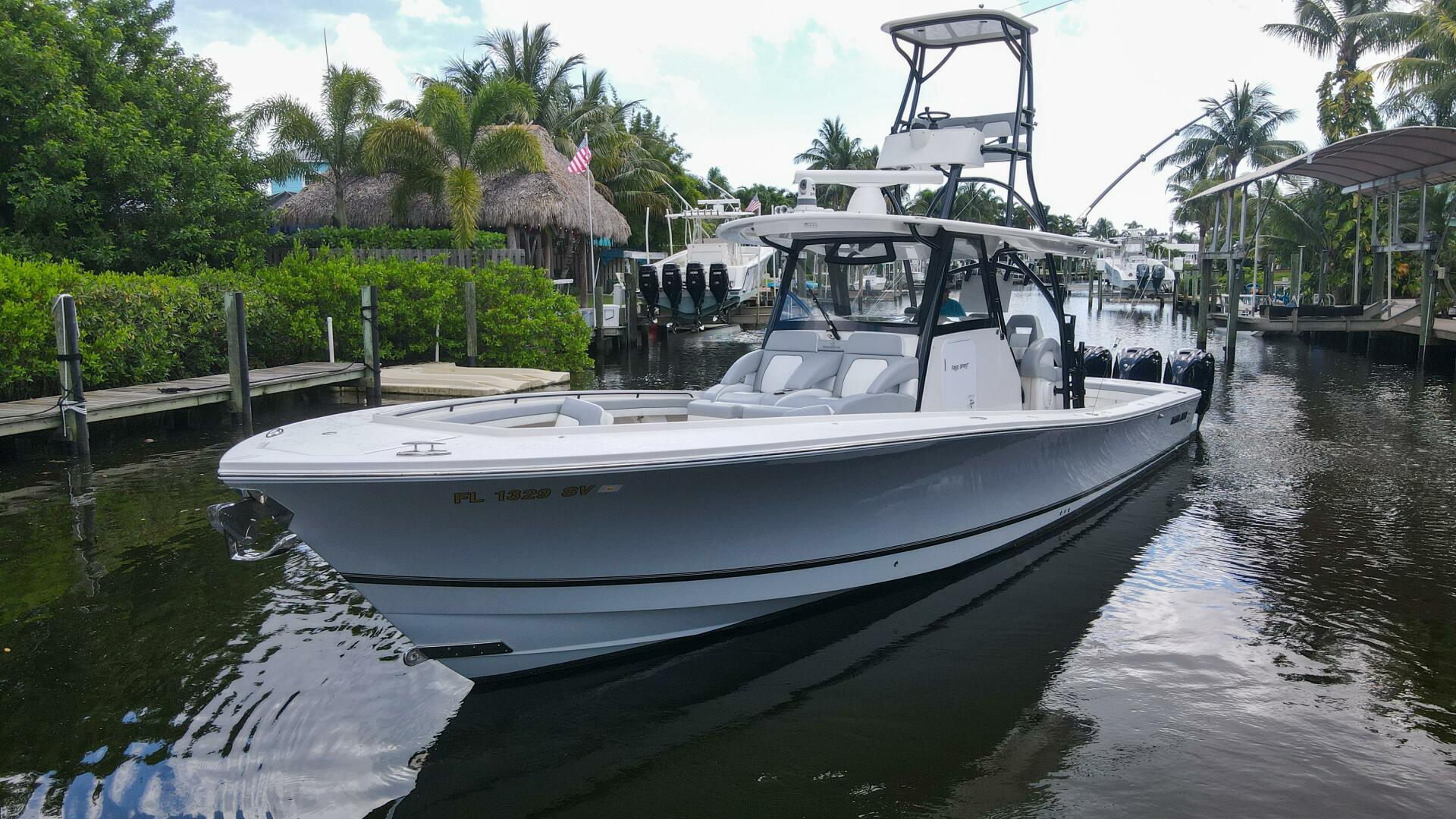 Regulator-41 2020-Grey Hull Stuart-2020 Regulator 41 boat docked in a tropical marina.-4946315 | Thumbnail