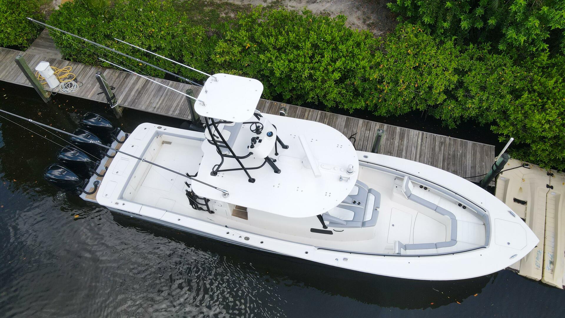 Regulator-41 2020-Grey Hull Stuart-Aerial view of a 2020 Regulator 41 boat docked by a wooden pier.-4946309 | Thumbnail
