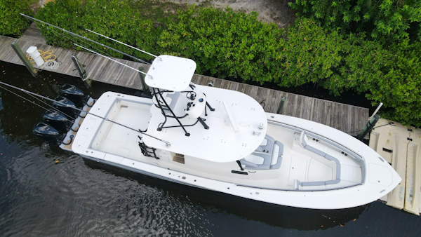 Regulator-41 2020-Grey Hull Stuart-Aerial view of a 2020 Regulator 41 boat docked by a wooden pier.-4946309