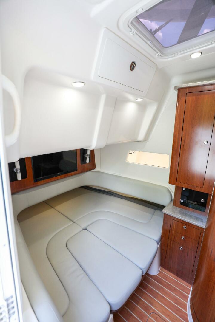 Regulator-41 2020-Grey Hull Stuart-2020 Regulator 41 boat cabin with leather seating and wooden cabinetry.-4946334 | Thumbnail