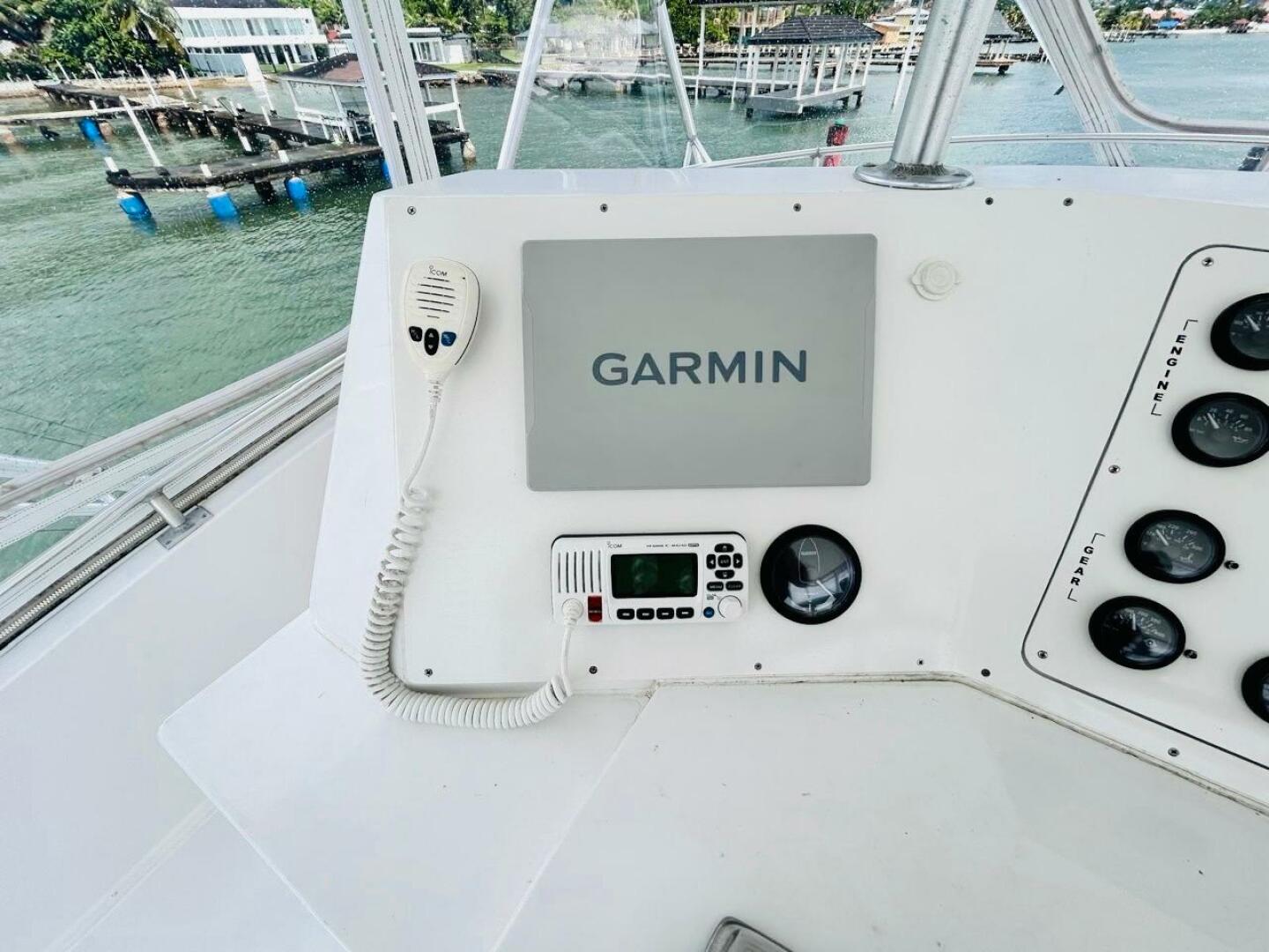 Bertram-54 1988 -Stuart-Bertram 54 1988 yacht helm with Garmin navigation system and radio controls.-4947245 | Thumbnail