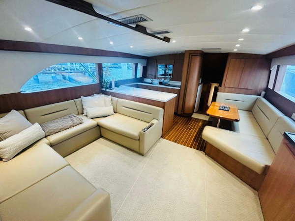 Bertram-54 1988 -Stuart-Luxurious interior of a 1988 Bertram 54 yacht with spacious seating and modern design.-4947221