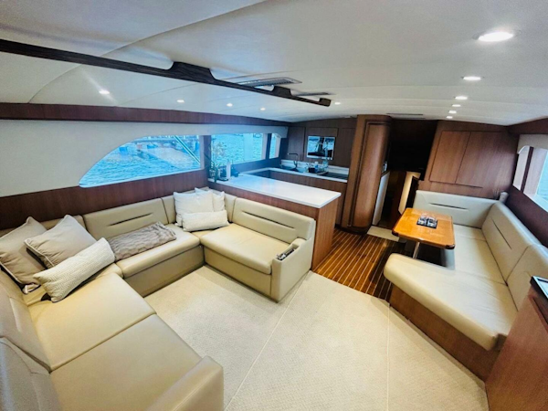 Bertram-54 1988 -Stuart-Luxurious interior of 1988 Bertram 54 yacht with spacious seating and modern design.-4947209