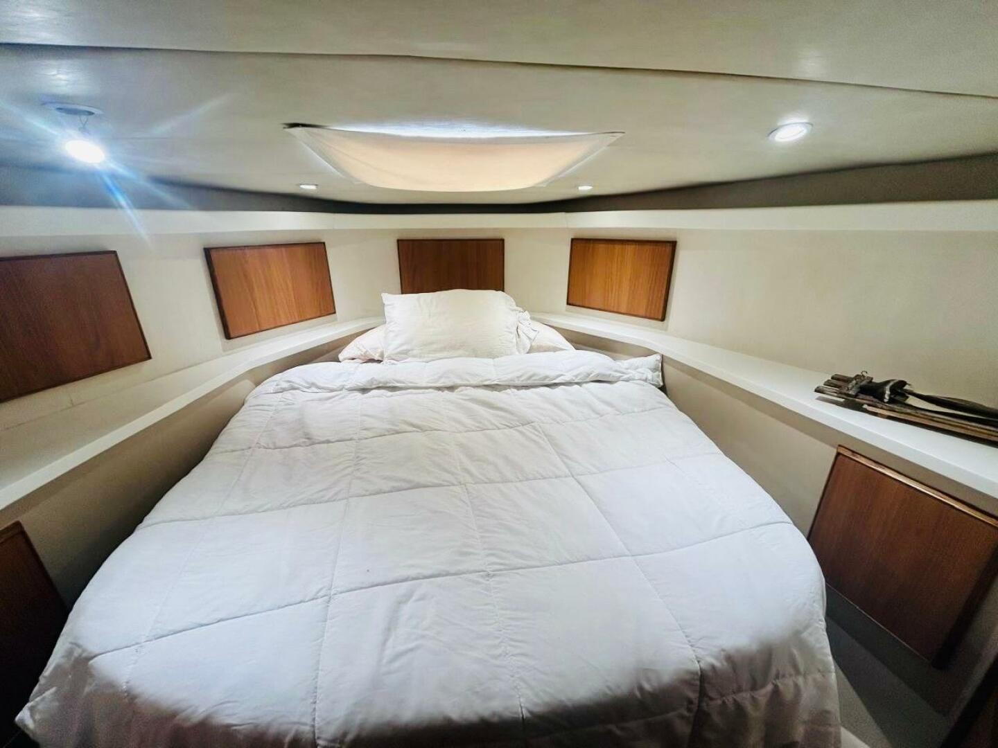 Bertram-54 1988 -Stuart-Luxurious bedroom interior of 1988 Bertram 54 yacht with cozy bedding.-4947215 | Thumbnail