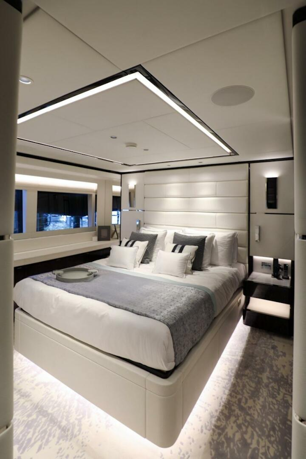Majesty Yachts-120 2025-Fractional Ownership Available Stuart-Florida-United States-Luxurious bedroom interior on 2025 Majesty 120 yacht, featuring modern design and elegant lighting.-4947548