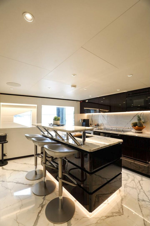 Majesty Yachts-120 2025-Fractional Ownership Available Stuart-Florida-United States-Luxurious 2025 Majesty 120 yacht interior with modern kitchen and sleek marble flooring.-4947545