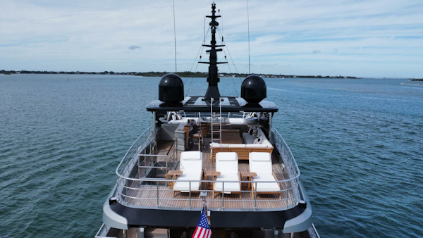 Majesty Yachts-120 2025-Fractional Ownership Available Stuart-Florida-United States-Majesty 120 yacht, 2025 model, cruising on open water with deck chairs and American flag.-5353500