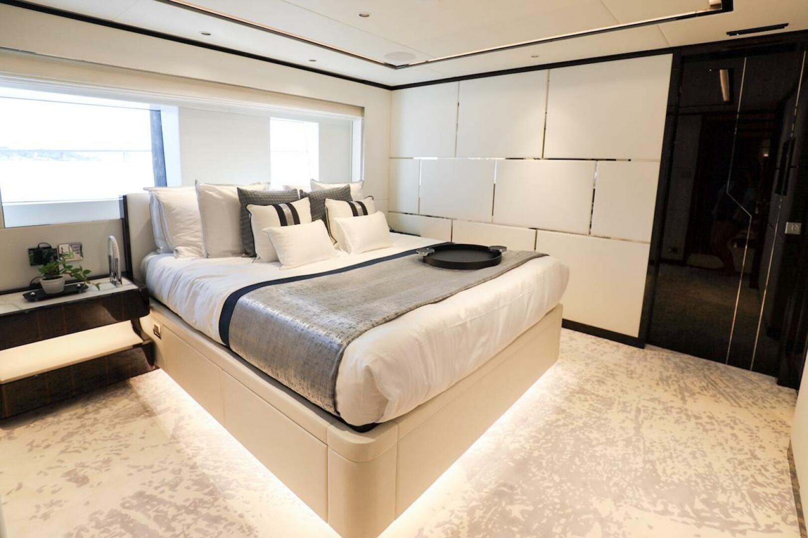 Majesty Yachts-120 2025-Fractional Ownership Available Stuart-Florida-United States-Luxurious bedroom interior on 2025 Majesty 120 yacht, featuring modern design and elegant furnishings.-4947556 | Thumbnail