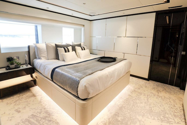 Majesty Yachts-120 2025-Fractional Ownership Available Stuart-Florida-United States-Luxurious bedroom interior on 2025 Majesty 120 yacht, featuring modern design and elegant furnishings.-4947556