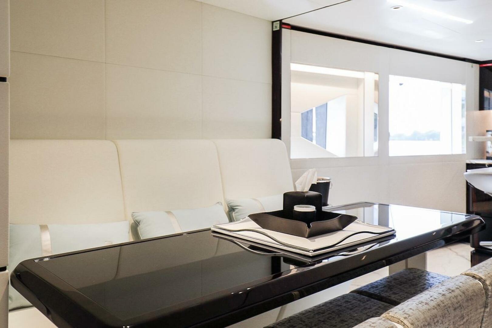 Majesty Yachts-120 2025-Fractional Ownership Available Stuart-Florida-United States-Luxurious interior of 2025 Majesty 120 yacht with sleek dining area and modern decor.-4947539 | Thumbnail