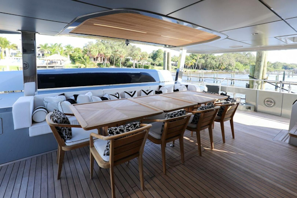 Majesty Yachts-120 2025-Fractional Ownership Available Stuart-Florida-United States-Luxurious 2025 Majesty 120 yacht deck with elegant dining area and scenic waterfront view.-4947533