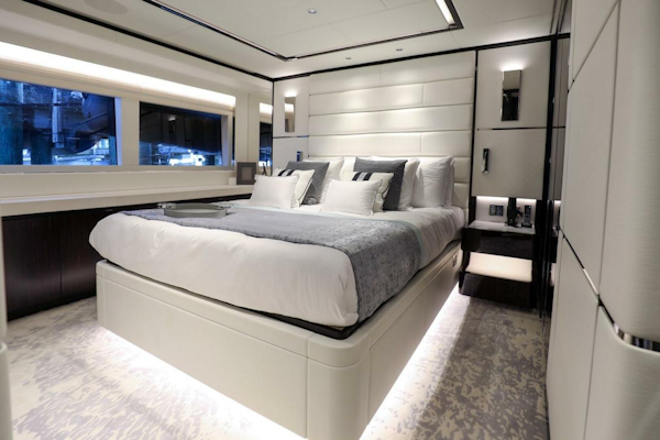 Majesty Yachts-120 2025-Fractional Ownership Available Stuart-Florida-United States-Luxurious bedroom interior of 2025 Majesty 120 yacht, featuring modern design and elegant furnishings.-4947549