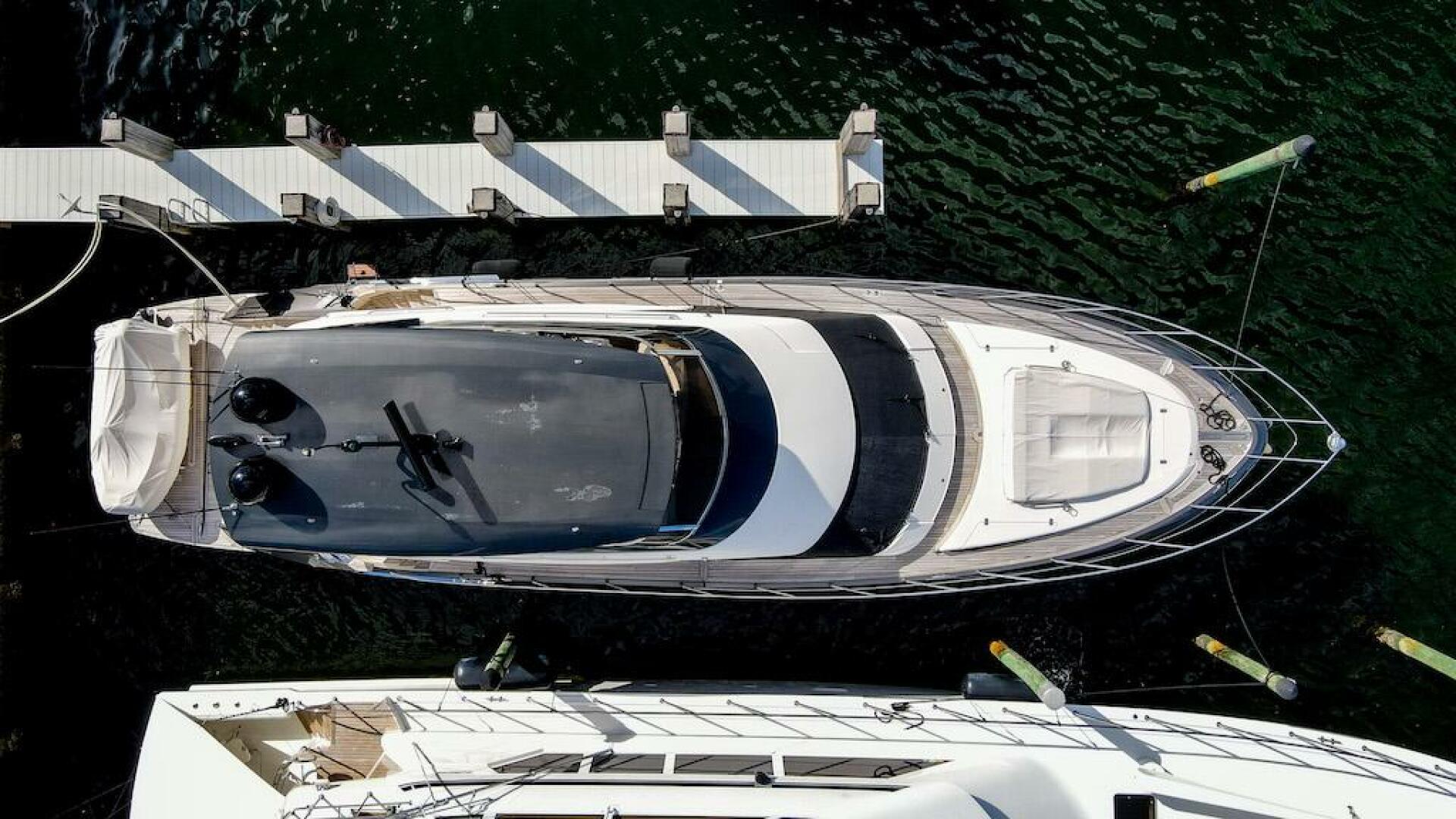 Marquis-660 Sport Yacht 2016 -Stuart-Aerial view of 2016 Marquis 660 Sport Yacht docked at marina.-4947601 | Thumbnail