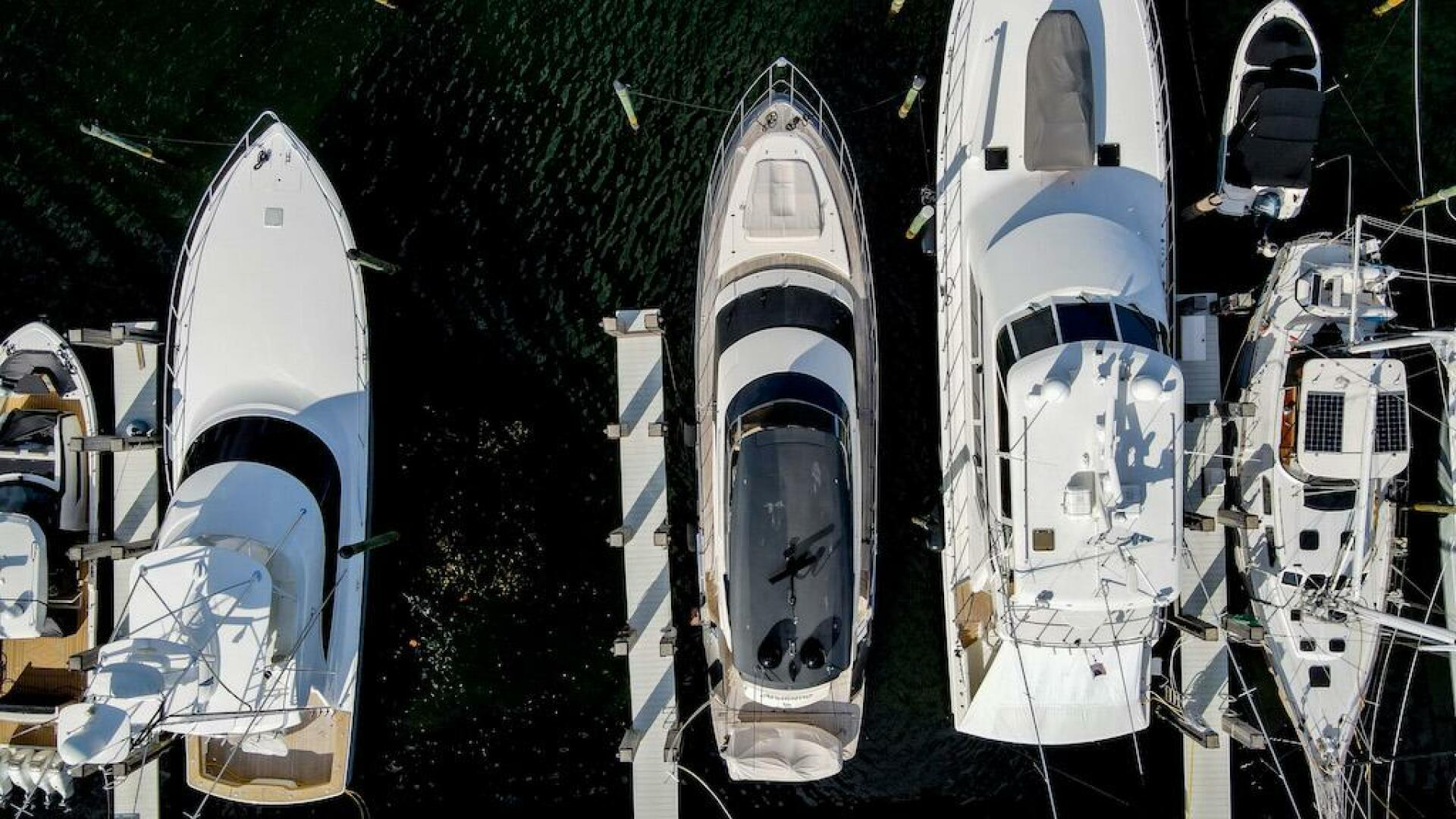 Marquis-660 Sport Yacht 2016 -Stuart-Aerial view of 2016 Marquis 660 Sport Yacht docked among other boats.-4947602 | Thumbnail