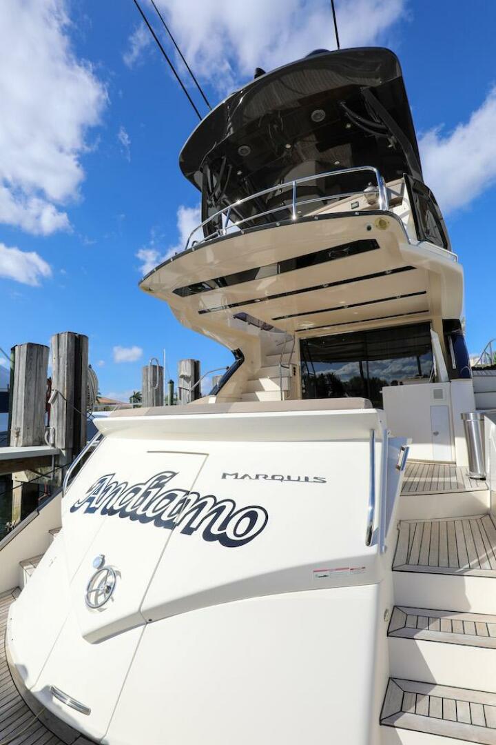 Marquis-660 Sport Yacht 2016 -Stuart-2016 Marquis 660 Sport Yacht docked under blue sky.-4947640 | Thumbnail