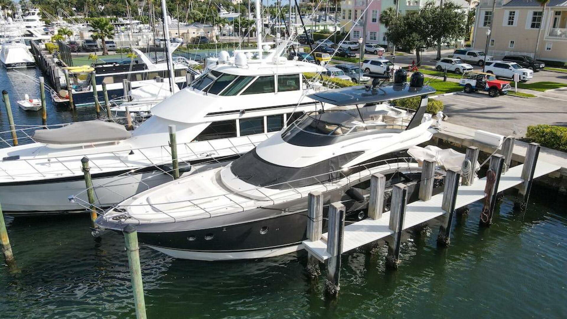 Marquis-660 Sport Yacht 2016 -Stuart-2016 Marquis 660 Sport Yacht docked at marina, aerial view.-4947608 | Thumbnail