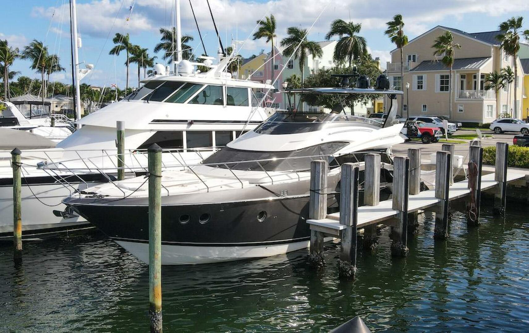 Marquis-660 Sport Yacht 2016 -Stuart-2016 Marquis 660 Sport Yacht docked at marina with palm trees.-4947605 | Thumbnail