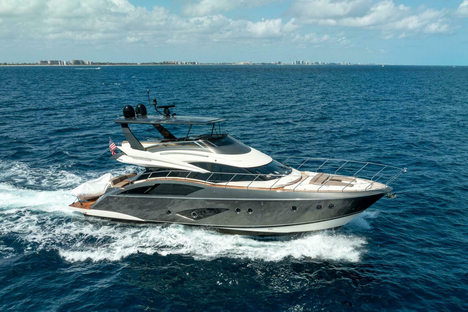 Marquis-660 Sport Yacht 2016 -Stuart-2016 Marquis 660 Sport Yacht cruising on open ocean under clear skies.-5143451 | Thumbnail