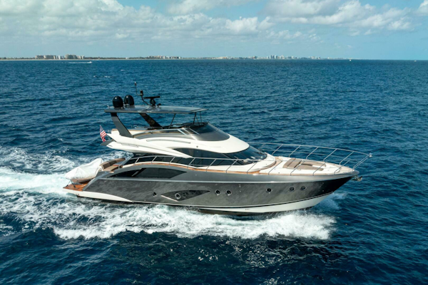 Marquis-660 Sport Yacht 2016 -Stuart-2016 Marquis 660 Sport Yacht cruising on open ocean under clear skies.-5143451