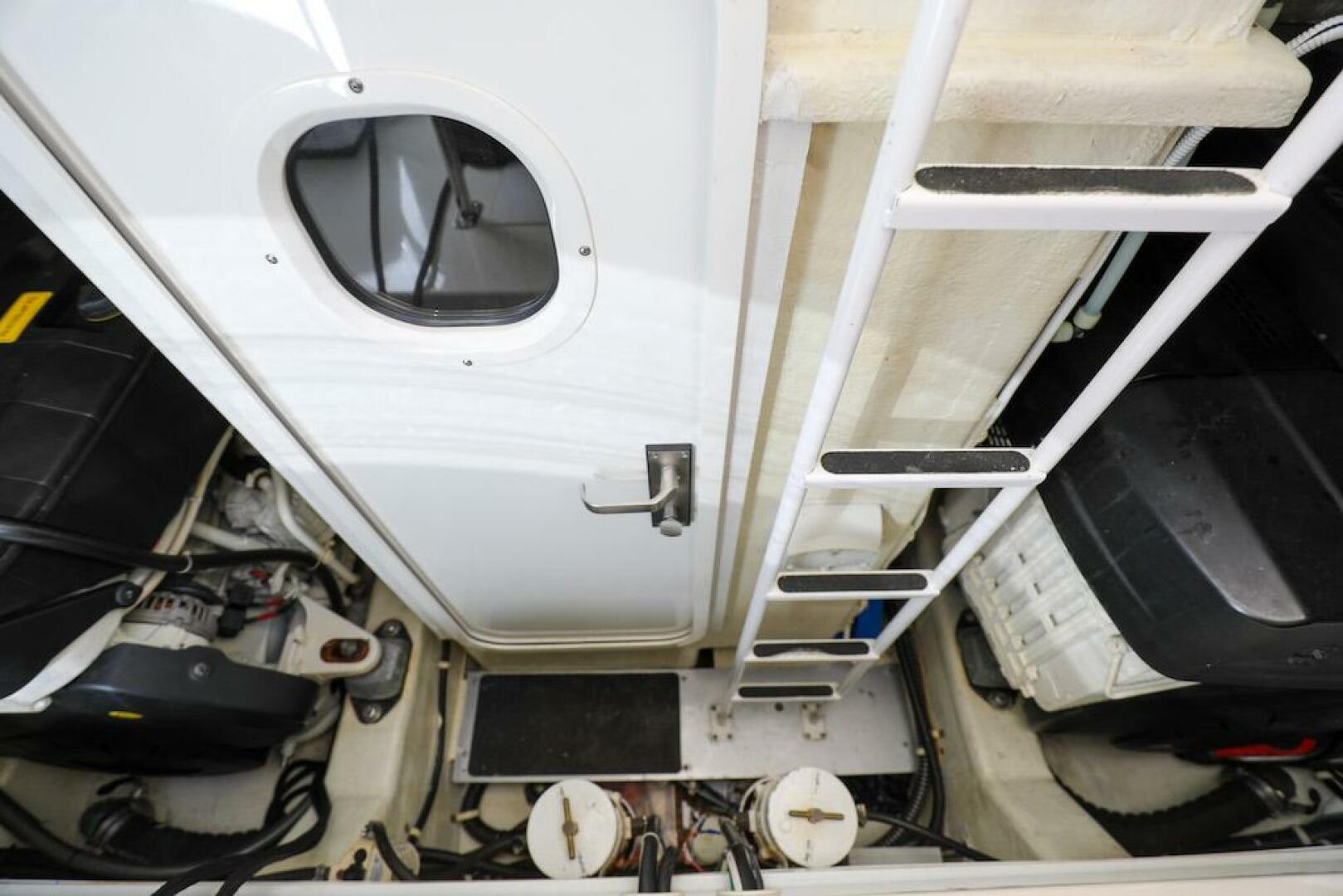 Marquis-660 Sport Yacht 2016 -Stuart-Engine room of 2016 Marquis 660 Sport Yacht with ladder and equipment.-4947648 | Thumbnail