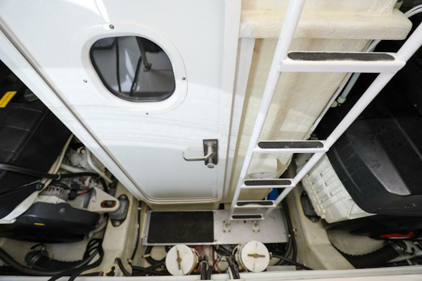 Marquis-660 Sport Yacht 2016 -Stuart-Engine room of 2016 Marquis 660 Sport Yacht with ladder and equipment.-4947648