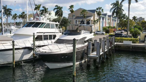 Marquis-660 Sport Yacht 2016 -Stuart-2016 Marquis 660 Sport Yacht docked in a sunny marina.-4947604