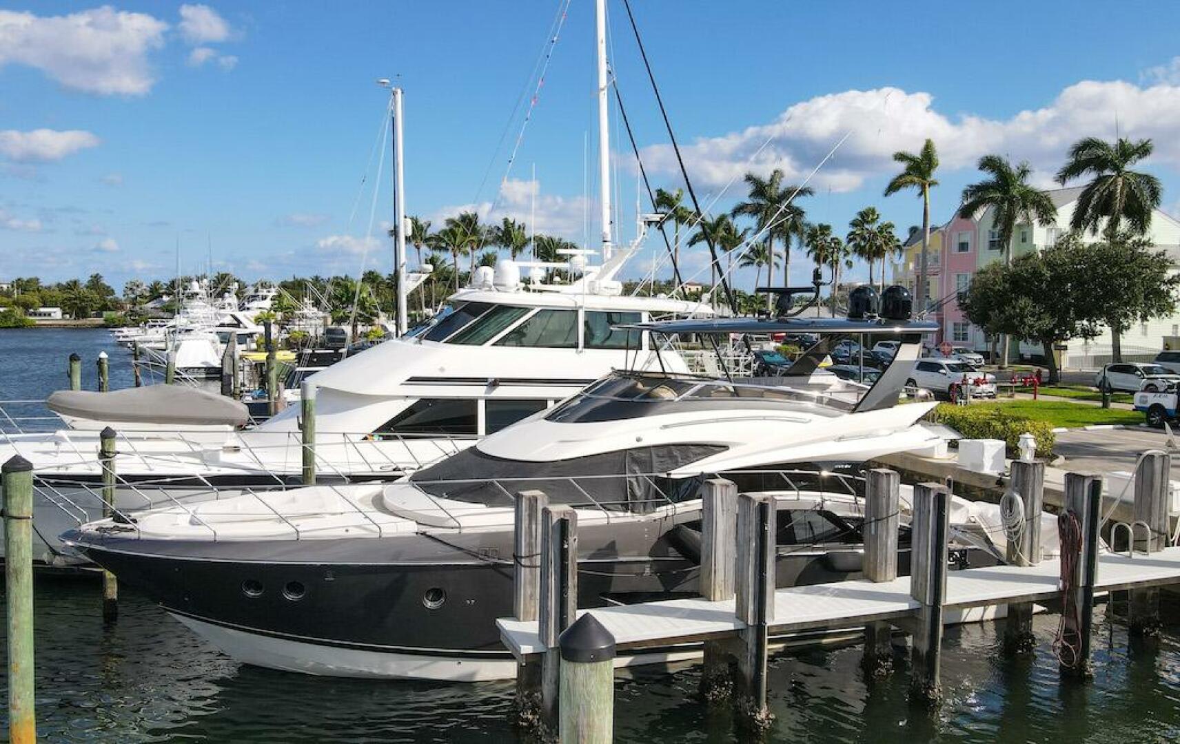 Marquis-660 Sport Yacht 2016 -Stuart-2016 Marquis 660 Sport Yacht docked in a sunny marina.-4947606 | Thumbnail