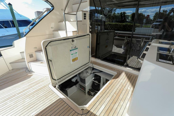 Marquis-660 Sport Yacht 2016 -Stuart-Open hatch on 2016 Marquis 660 Sport Yacht deck, revealing storage compartment.-4947645