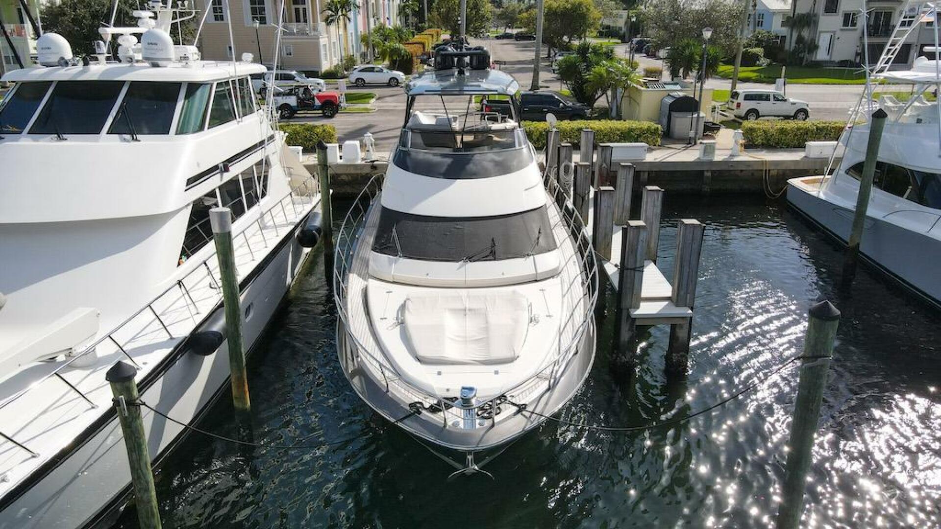 Marquis-660 Sport Yacht 2016 -Stuart-2016 Marquis 660 Sport Yacht docked at marina, aerial view.-4947609 | Thumbnail