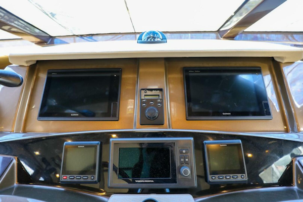 Marquis-660 Sport Yacht 2016 -Stuart-Control panel of 2016 Marquis 660 Sport Yacht with multiple screens and navigation equipment.-4947619