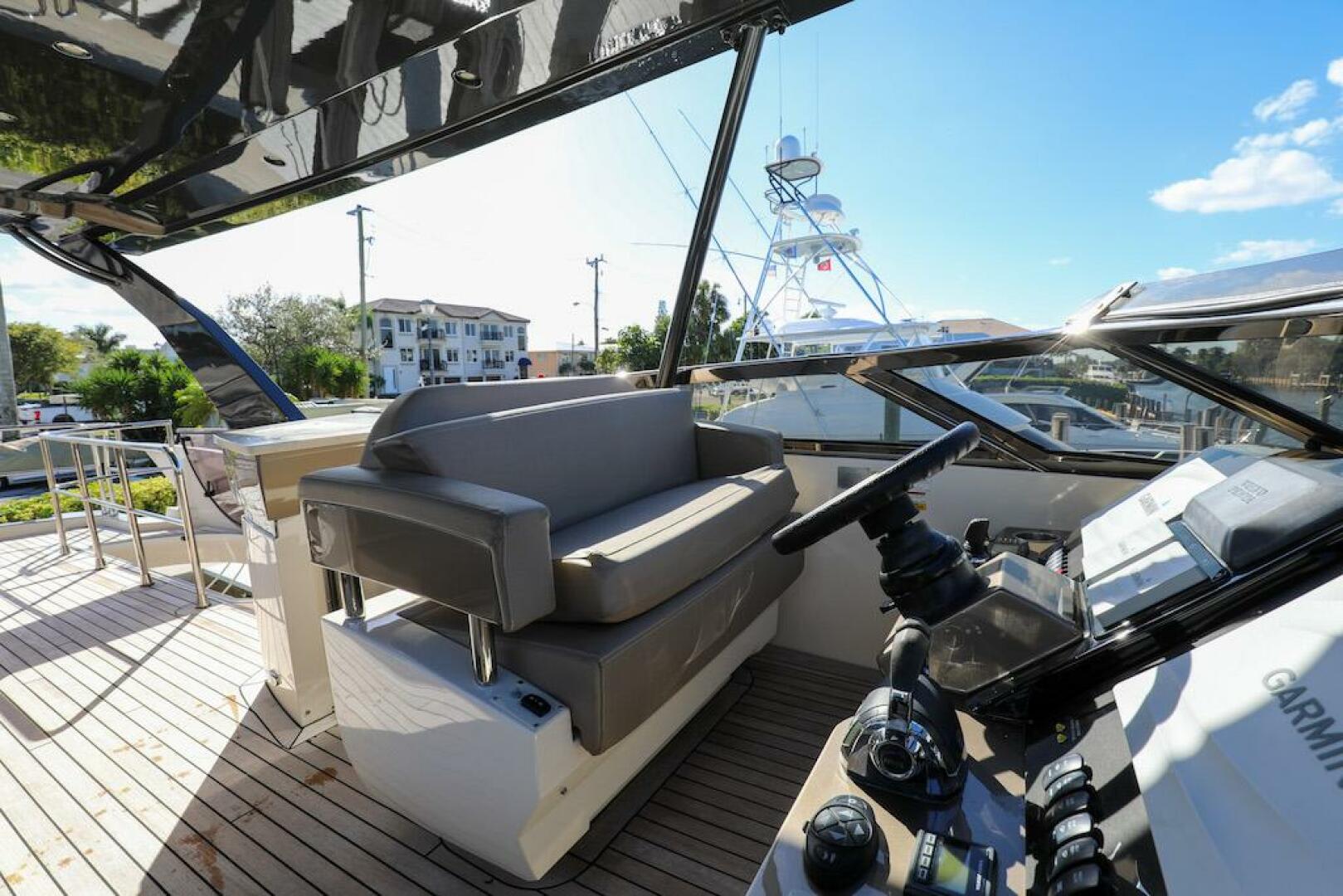 Marquis-660 Sport Yacht 2016 -Stuart-2016 Marquis 660 Sport Yacht cockpit with modern controls and seating.-4947628 | Thumbnail